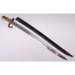 A French model 1866 Chassepot bayonet, having a 57cm singled edged fullered Yataghan shaped blade,