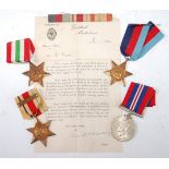 A WW II group of four to include 1939-45 Star, Africa Star with 1st Army clasp,