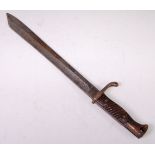 A German 1898/05 pattern butcher bayonet, having a 33.5cm blade and ribbed two piece grip, 47cm.
