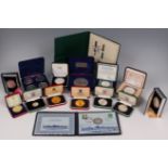 Fifteen various cased silver coins and coin sets, to include; Royal Salute 1977 4-coin set,