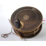 A Malloch of Perth 4 1/2" brass centre pin salmon fly reel, stamped P.D. Malloch Maker Perth.