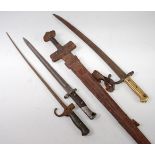 A French model 1886 bayonet, 63cm, together with a Czechoslovakian mauser bayonet,