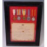 A group of five medals to include WW I 1914-15 Star, British War and Victory with oak leaves,