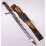 A German model 98/05 mauser bayonet the 36cm single edged fullered blade stamped to the ricasso C.G.