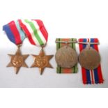 A WW II group of four to include 1939-45 Star, Italy Star, Defence and War.
