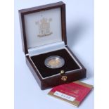 Great Britain, cased 2002 gold proof £10 coin, Elizabeth II above denomination, red.