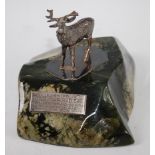 An Edwardian silver model of a stag, mounted on a polished hardstone base with presentation plaque,