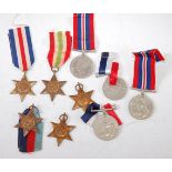 A collection of nine WW II medals to include Defence, War x3, 1939-45 Star x2,