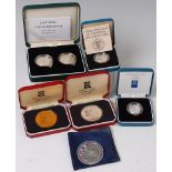 Six silver proof coins, to include; 1997-1998 two pound two-coin set, 1985 & 1999 one pound,