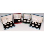 Great Britain, four cased silver proof coin sets, to include; 2x one pound 4-coin sets,