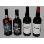 Warre's Crusted Port, bottled 1980, two bottles; Rocha's Old Tawny Port,