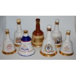 Five various Bell's Royal commemorative Scotch Whisky decanters, all unboxed,