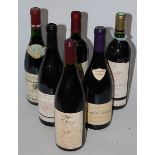 Fourteen bottles of assorted red wine, many for The Wine Society,