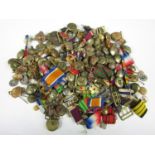 A quantity of assorted military buttons and rank insignia together with a 1933 - 1934 Aldershot