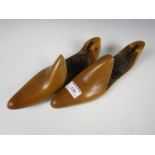 A pair of vintage wooden shoe lasts