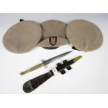 A Fairbairn Sykes knife and three SAS berets