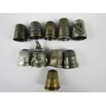 A collection of silver and other thimbles