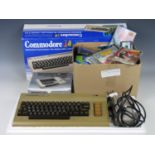 A Commodore 64 together with games and accessories