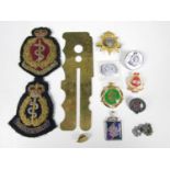 Sundry military badges etc., including two bullion examples, a white metal Border Regiment fob