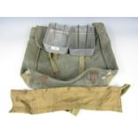 A webbing military motor cycle pannier bag, Second World War mess tins and a cotton bandolier