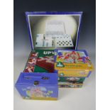 Vintage games including a 3 in 1 Glass Compendium, Cluedo and Upwords, together with two jigsaws