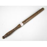 A wooden truncheon