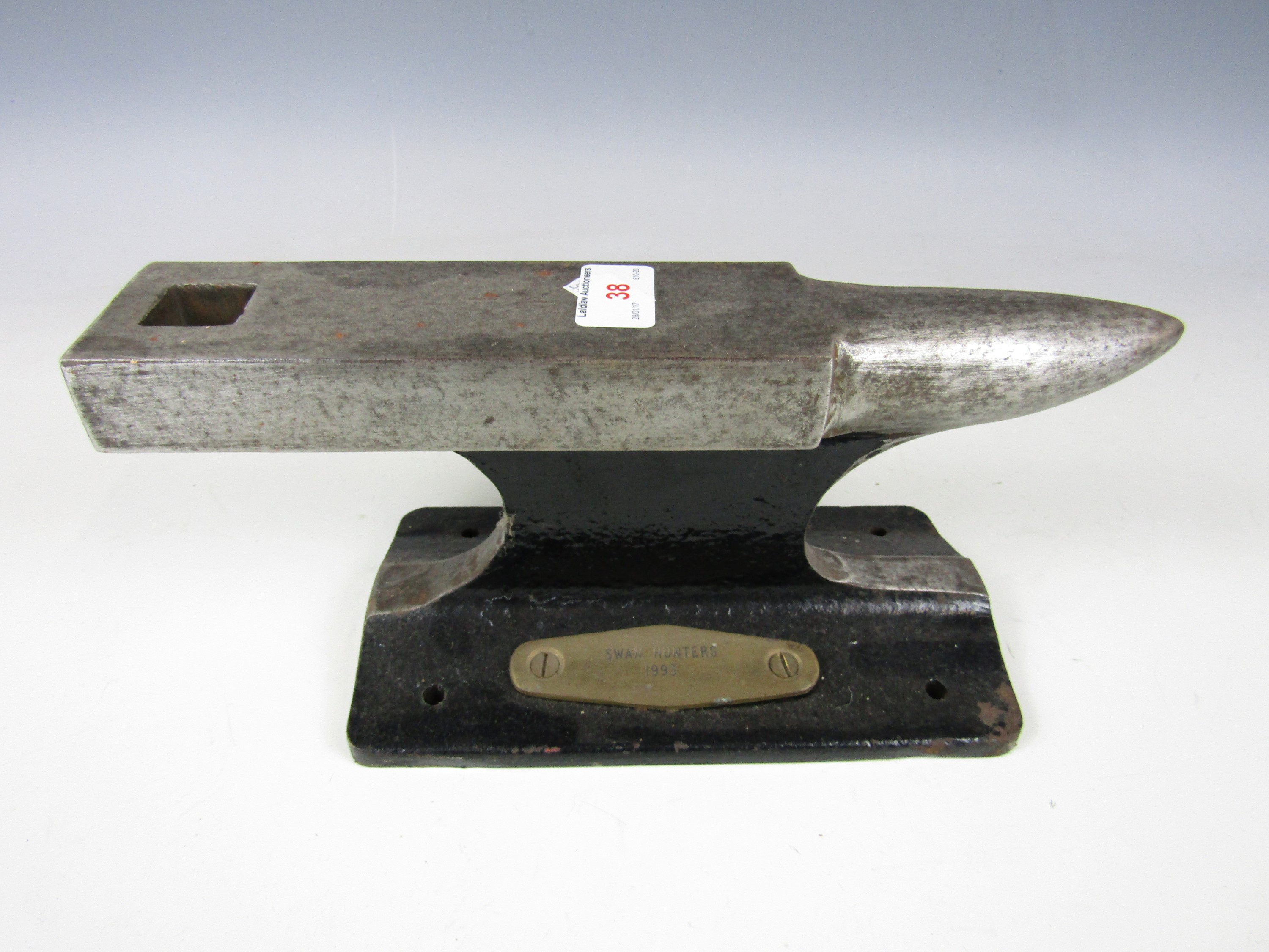 A small anvil with plaque Swan Hunters 1993