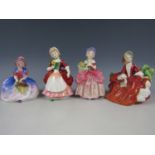 Four Royal Doulton figurines including Cissie HN1809, Valerie HN2107, Monica HN1467 and Lydia