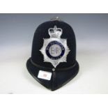 A post 1952 Metropolitan Police helmet