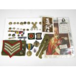 Military buttons, various other items of insignia, a button stick, Royal commemoratives and a