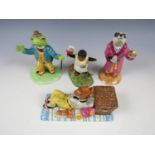 Four Royal Doulton figurines including Wind in the Willows etc