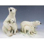 A Country Artists polar bear with cub, and a Sherrat Simpson polar bear and cubs