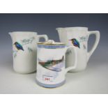 Two Royal Doulton Kingfisher jugs together with a Royal Doulton Battle of Britain tankard