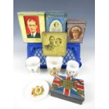 A quantity of Royal Commemorative tins and ceramic beakers