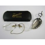 Pince nez glasses together with a caddy spoon