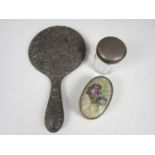 An Edwardian silver hand mirror, Birmingham, 1905, (a/f), a small 1930s clothes brush with hand-