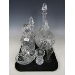 Three crystal decanters, a basket and a lidded bowl etc
