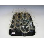 Six Martini glasses, together with six amber glasses etc.