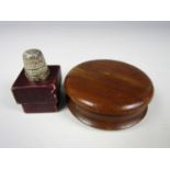 A Victorian turned wood snuff box together with a silver Coronation commemorative thimble