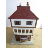 A large dolls' house and furnishings