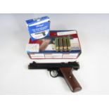 A boxed Benjamin EB22 gas cartridge air pistol and accessories