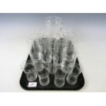 An Edwardian etched glass lemonade set together with other glasses