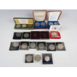 A quantity of cased commemorative Crown coins etc