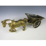 A brass horse and cart