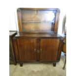 A 1940's oak sideboard with glazed display