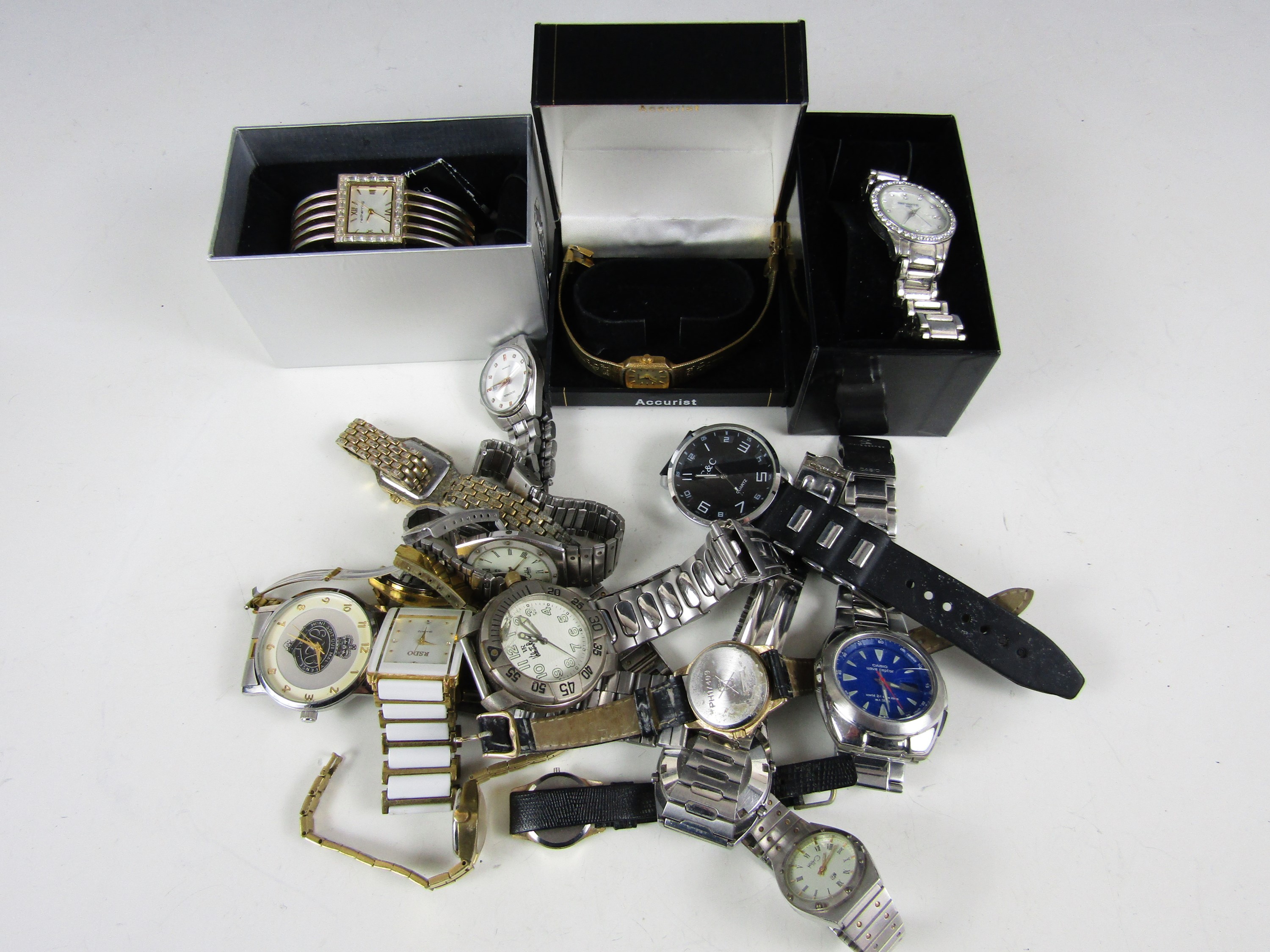 A large quantity of vintage and modern wristwatches, including a Red Herring watch in its original