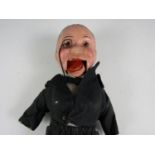 A child's vintage ventriloquist's doll