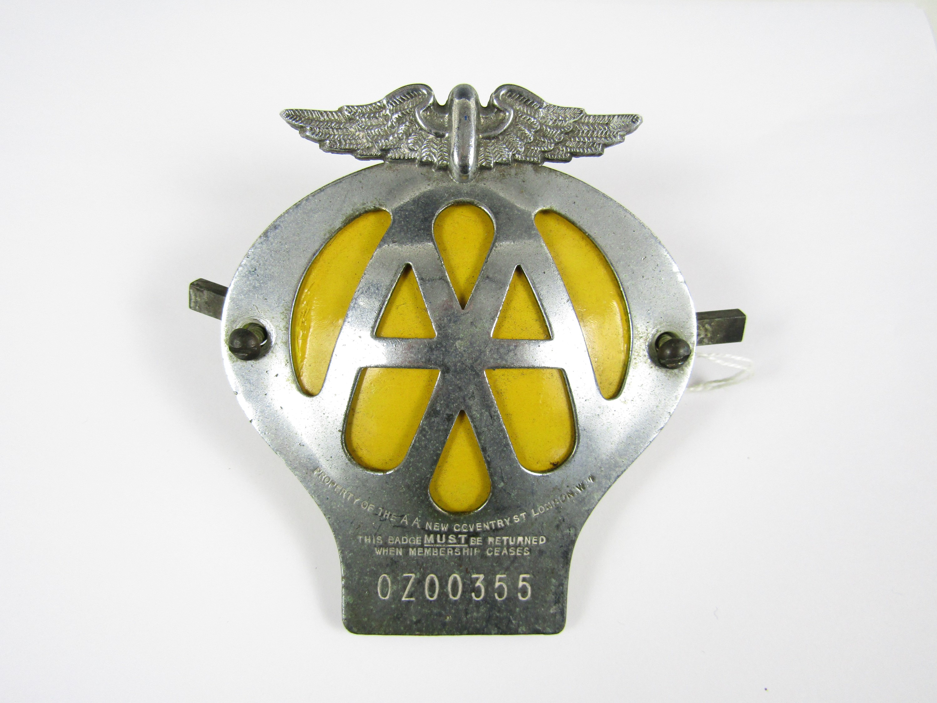 A vintage AA car badge