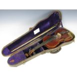 A cased violin and bow