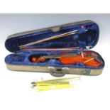 A cased Stentor Student II violin together with two contemporary bows and a music stand